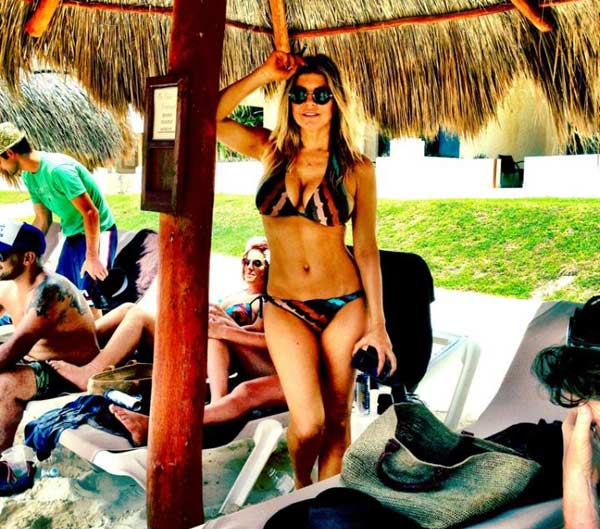 Fergie appears in a bikini in this photo she posted on her Twitter page on May 29, 2012 during a trip to Mexico and husband Josh Duhamel. Adios Cancun! she said. - Provided courtesy of t.co/4z9z5hng / twitter.com/Fergie