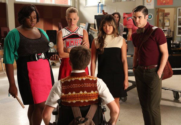 Unique (guest star Alex Newell), Brittany (Heather Morris), Tina (Jenna Ushkowitz) and Blaine (Darren Criss) ask Artie (Kevin McHale, bottom) to pick one of them as the next glee club star in the season 4 premiere episode of 'Glee' in 2012.