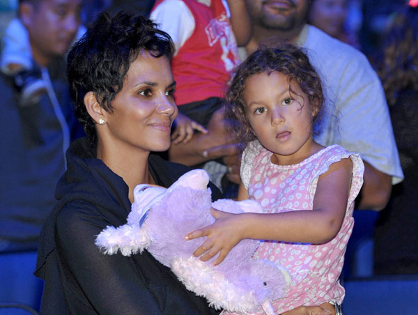 Halle Berry, left, and daughter Nahla Aubry attend attend 'Yo Gabba Gabba! Live!: Get The Sillies Out!' 50+ city tour kick-off performance on Thanksgiving weekend at the Nokia Theatre L.A. Live on Nov. 23, 2012 in Los Angeles.