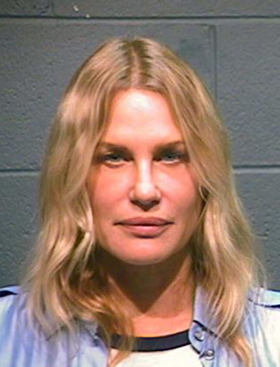 <b>Daryl Hannah appears in a booking photo after...
