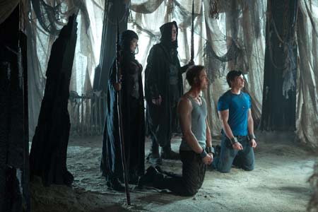 Justin Hartley appears as Oliver Queen and Tom...