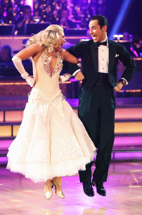 Helio Castroneves and Chelsie Hightower appear...