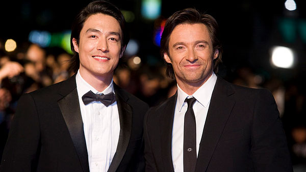 Hugh Jackman and Daniel Henney appear in a photo...