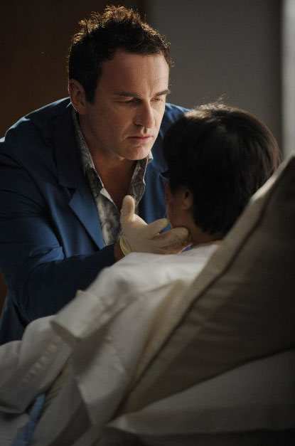 Julian McMahon appears in a scene from the show...