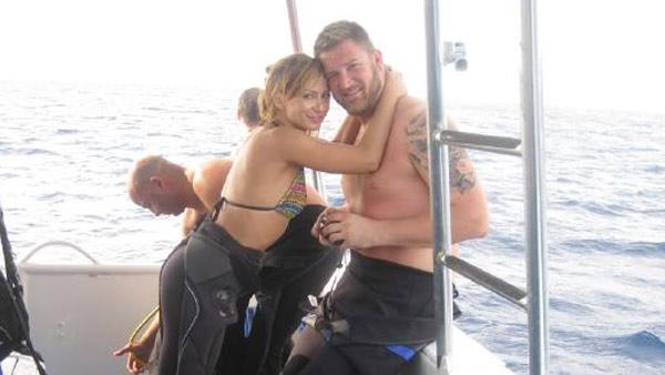 Brad Penny and Karina Smirnoff appear in a photo...