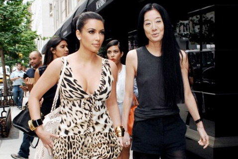 Kim Kardashian appears alongside designer Vera...