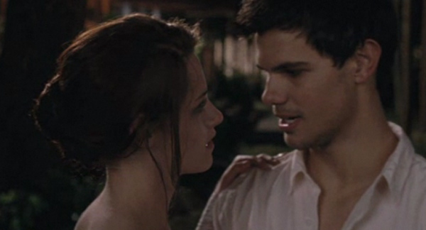 Kristen Stewart appears as Bella Swan and Taylor...