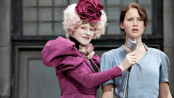 Jennifer Lawrence appears in a scene from the 2012 film 'The Hunger Games.' She stands alongside Elizabeth Banks who plays Effie Trinket in the film.