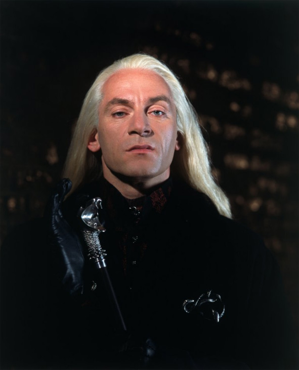 Lucius Malfoy (Jason Isaacs) appears in a scene...