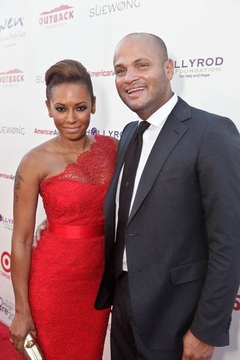 Melanie Brown, aka Mel B. of the Spice Girls and...