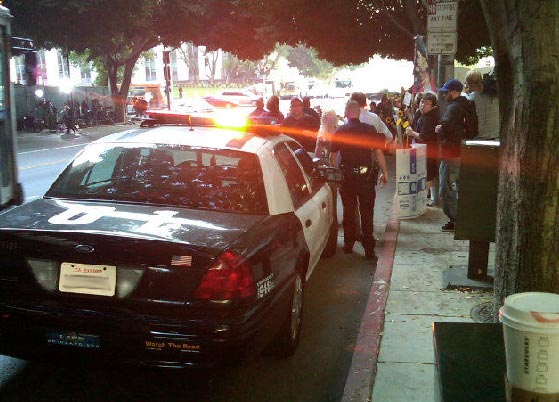 Sept. 27, 2011: A police officer parks his squad car outside the Los Angeles courthouse where Conrad Murray is on trial for involuntary manslaughter, following the 2009 death of Michael Jackson.