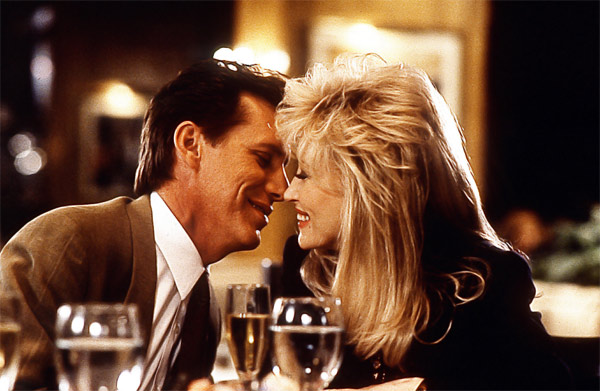 Dolly Parton and James Woods appear in a scene...