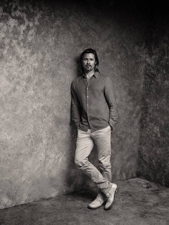 Brad Pitt appears in a behind-the-scenes photo...