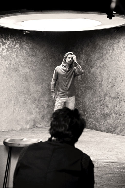 Brad Pitt appears in a behind-the-scenes photo...