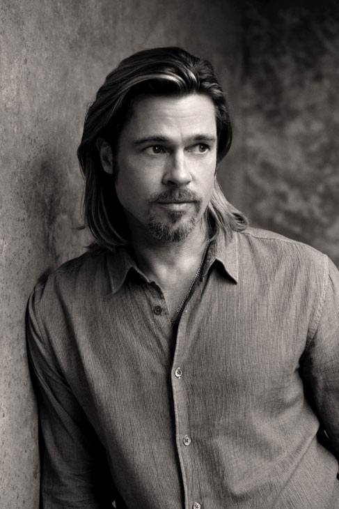 Brad Pitt appears in a behind-the-scenes photo...