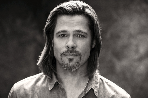 Brad Pitt appears in a behind-the-scenes photo...