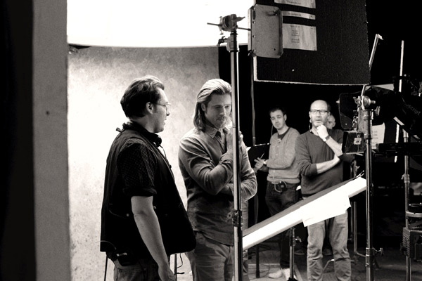 Brad Pitt appears in a behind-the-scenes photo...