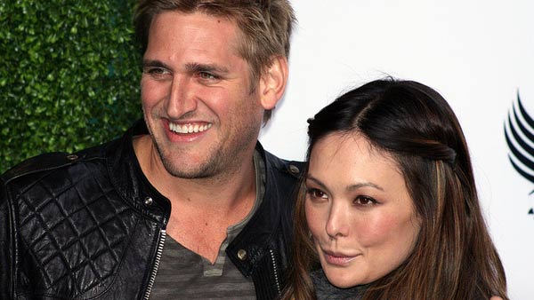 Lindsay Price and Curtis Stone appear in a photo...
