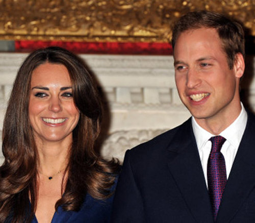 Prince William and Catherine Middleton hold a...