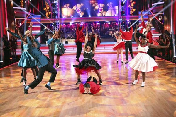 A professional dance group appears on 'Dancing...