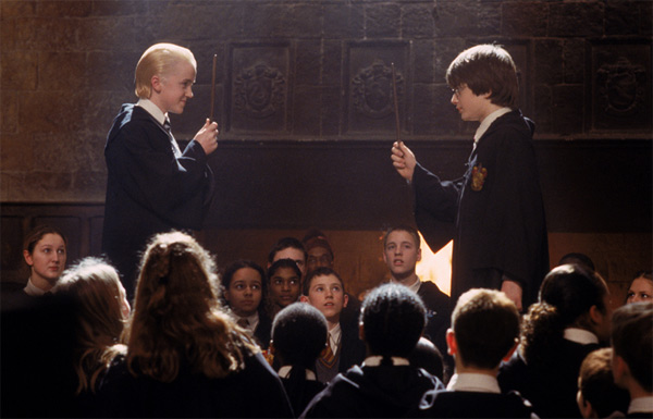 Draco Malfoy (Tom Felton) and Harry Potter...