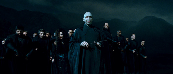 The evil wizard Lord Voldemort (Ralph Fiennes) and his followers, or Death Eaters, appear in a scene from the 2011 film 'Harry Potter and the Deathly Hallows - Part 2.'