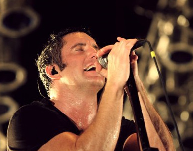 Trent Reznor appears on stage at a Nine Inch Nails concert at the Ford Amphitheatre in Tampa, Florida, on May 29, 2009.
