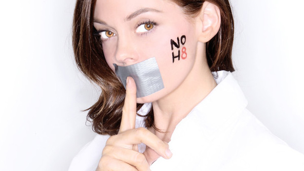 McGowan appears in a photo she did for the NOH8 campaign from their official website.