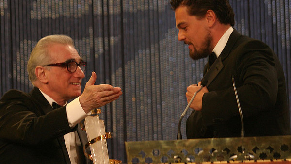Martin Scorsese appears in a photo with Leonardo...