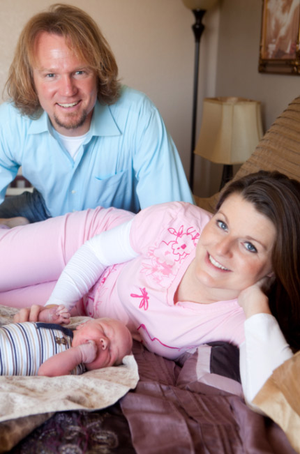 Polygamist Kody Brown and his wife Robyn of the controversial TLC reality show 'Sister Wives' welcomed their first child together - and his 17th - on Oct. 26, 2011. They are pictured with their son in this photo provided by the TLC cable network.