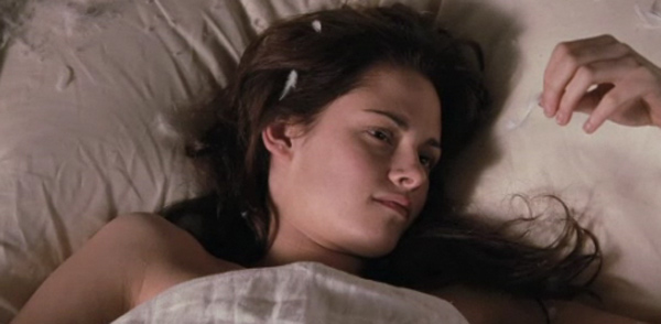 Kristen Stewart appears as Bella Swan in a scene...