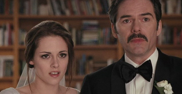 Kristen Stewart appears as Bella Swan and Billy Burke appears as her father in a scene from 'The Twilight Saga: Breaking Dawn - Part 1.'