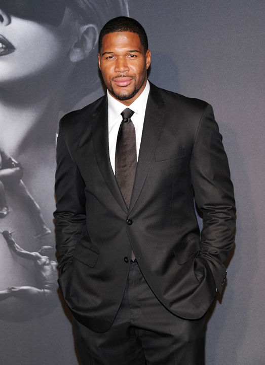 Michael Strahan arrives at a 
