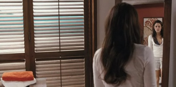 Kristen Stewart's character Bella Swan looks at...