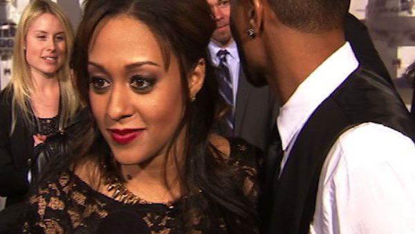 Pregnant Tia Mowry of 'Sister, Sister' and husband Cory Hardrict appear at the L.A. premiere of his film 'Battle: Los Angeles' on March 8, 2011.