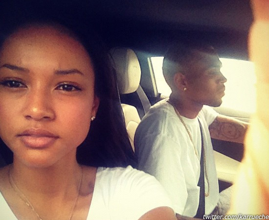Karrueche Tran and Chris Brown appear in a photo...