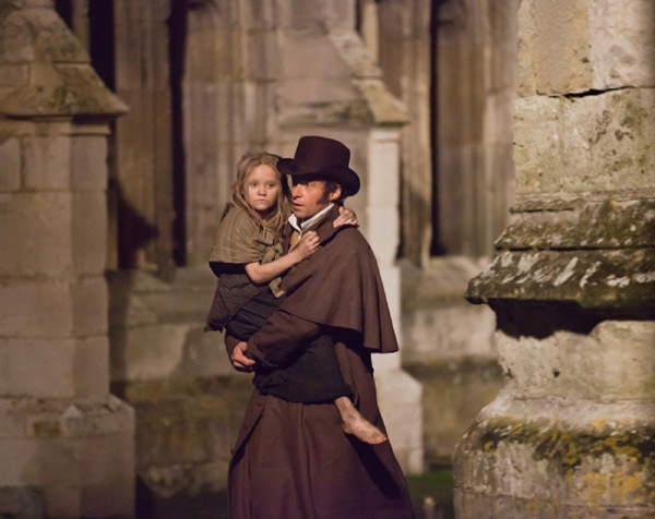 Hugh Jackman and Isabelle Allen appear as Jean...