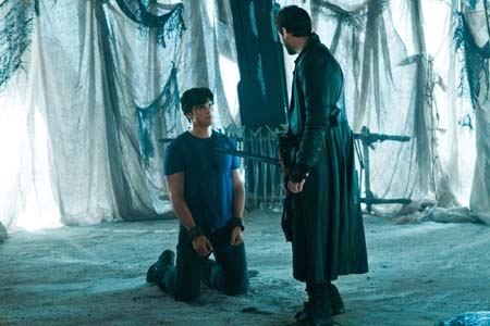 Callum Blue appears as Zod and Tom Welling as...