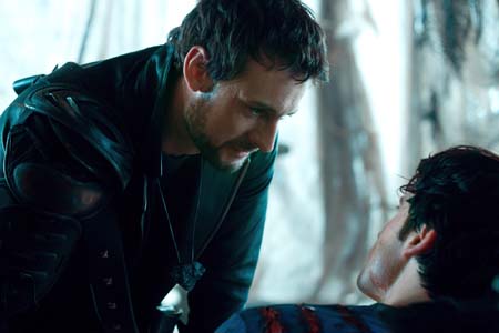 Callum Blue appears as Zod and Tom Welling as...