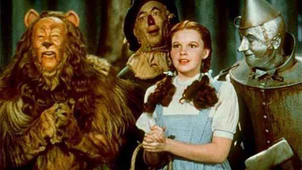 From left: Bert Lahr, Ray Bolger, Judy Garland...