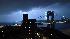 Lightning over the bridge on August 18, 2009 by Tillie.