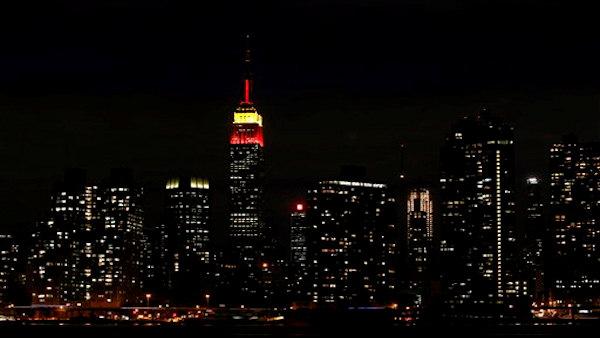The Empire State Building is lit in red and yellow to honor the 60th anniversary of the founding of the Peoples Republic of China in this photo taken from across the East River Wednesday, Sept. 30, 2009 in the Queens borough of New York. The color scheme has caused controversy among critics of the Chinas communist government. (AP Photo/Jason DeCrow)