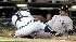 Detroit Tigers catcher Gerald Laird (8) loses control of the ball as New York Yankees Mark Teixeira scores during the fourth inning of a baseball game in Detroit, Wednesday, April 29, 2009. Teixeira, Derek Jeter and Johnny Damon scored on a double to center field by Hideki Matsui. (AP Photo/Carlos Osorio)