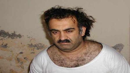 In a file photo Khalid Sheikh Mohammed, the alleged Sept. 11 mastermind, is seen shortly after his capture during a raid in Pakistan Saturday March 1, 2003, in this photo obtained by the Associated Press. In his book Pakistans President Gen. Pervez Musharraf wrote that Mohammed was behind the July 7, 2005, London subway bombings and plans to attack Heathrow airport with hijacked passenger planes. (AP Photo)