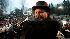 Punxsutawney Phil, left, is held by Ben Hughes...