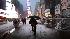 Early morning pedestrians walk in New Yorks...