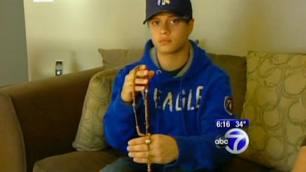 Teen faces suspension over rosary beads