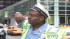 NYPD traffic officer sweats profusely as he...