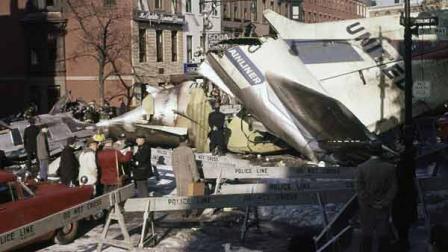 In this Dec. 16, 1960 file photo, rescue workers search for survivors in the remains of the United Air Lines jet that crashed at Seventh Avenue and Sterling Place in the Brooklyn neighborhood of Park Slope after the airliner collided with a TWA propeller plane one mile above New York City. It was the deadliest air disaster up to that time, killing all 128 people on both aircraft and six on the ground.