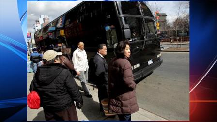 Passengers in Manhattans Chinatown neighborhood in New York wait to board a bus to the Mohegan Sun casino Tuesday, March 15, 2011. About 30,000 Chinese New Yorkers per week board discount buses that take them from Chinatown to casinos outside the city. But tour bus operators say business is down after a bus crashed Saturday, March 12, on a return trip from a Connecticut casino, killing 15 passengers. (AP Photo/Seth Wenig)